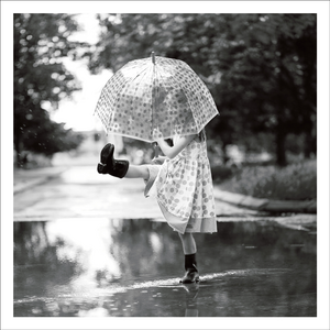 AGCP042 - Girl In Gumboots Kicking Puddle Under Umbrella - Photographic Card