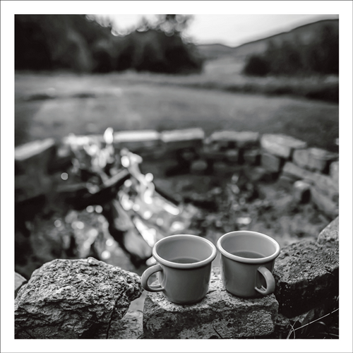 AGCP046 - Two Mugs Of Tea Sitting On Brick Fire Pit - Photographic Card